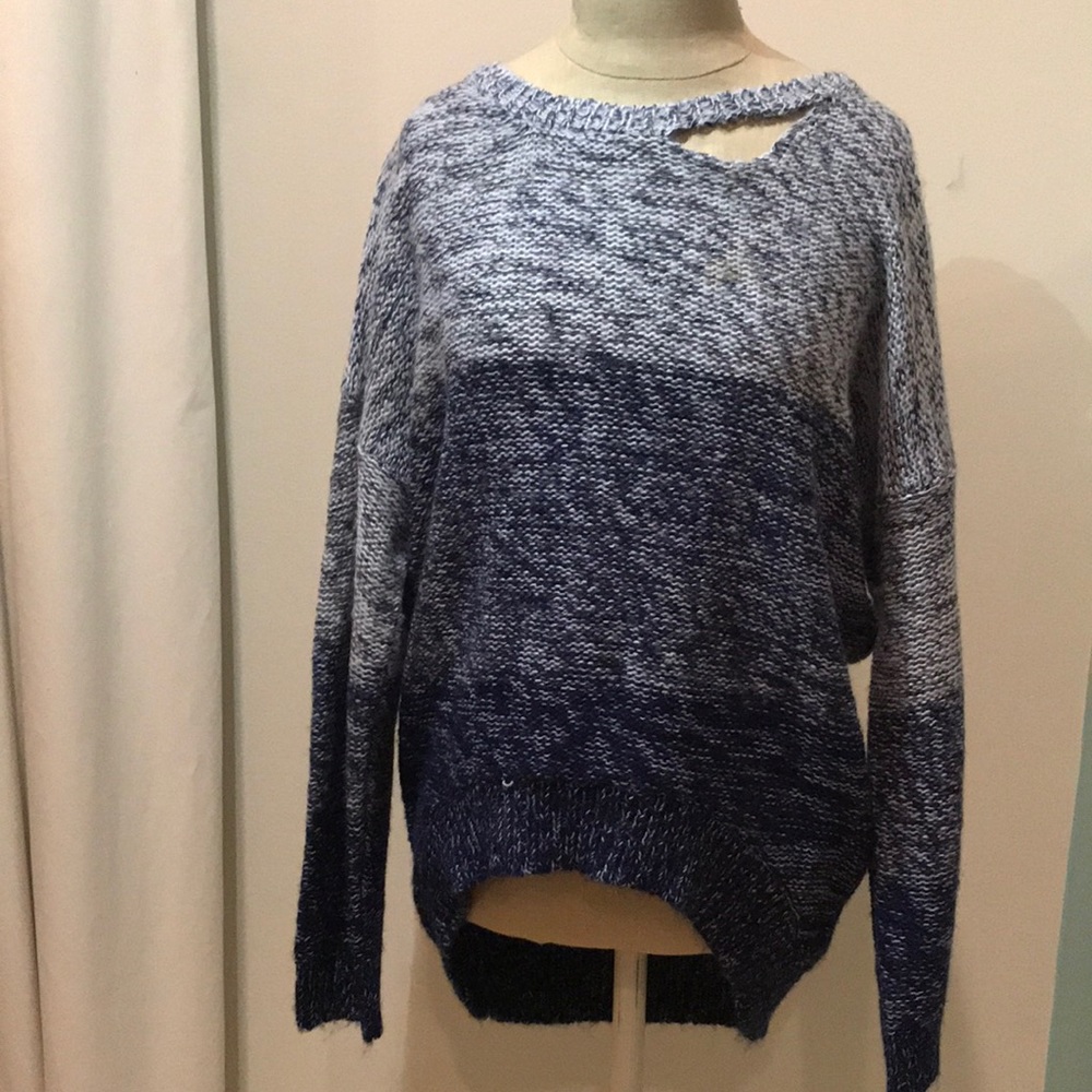 Faded blue sweater